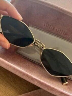 Miu Miu MU 56ZS Gold Metal Frame Sunglasses with Dark Grey Lenses